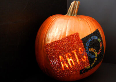 Arts Division logo on a pumpkin for Halloween
